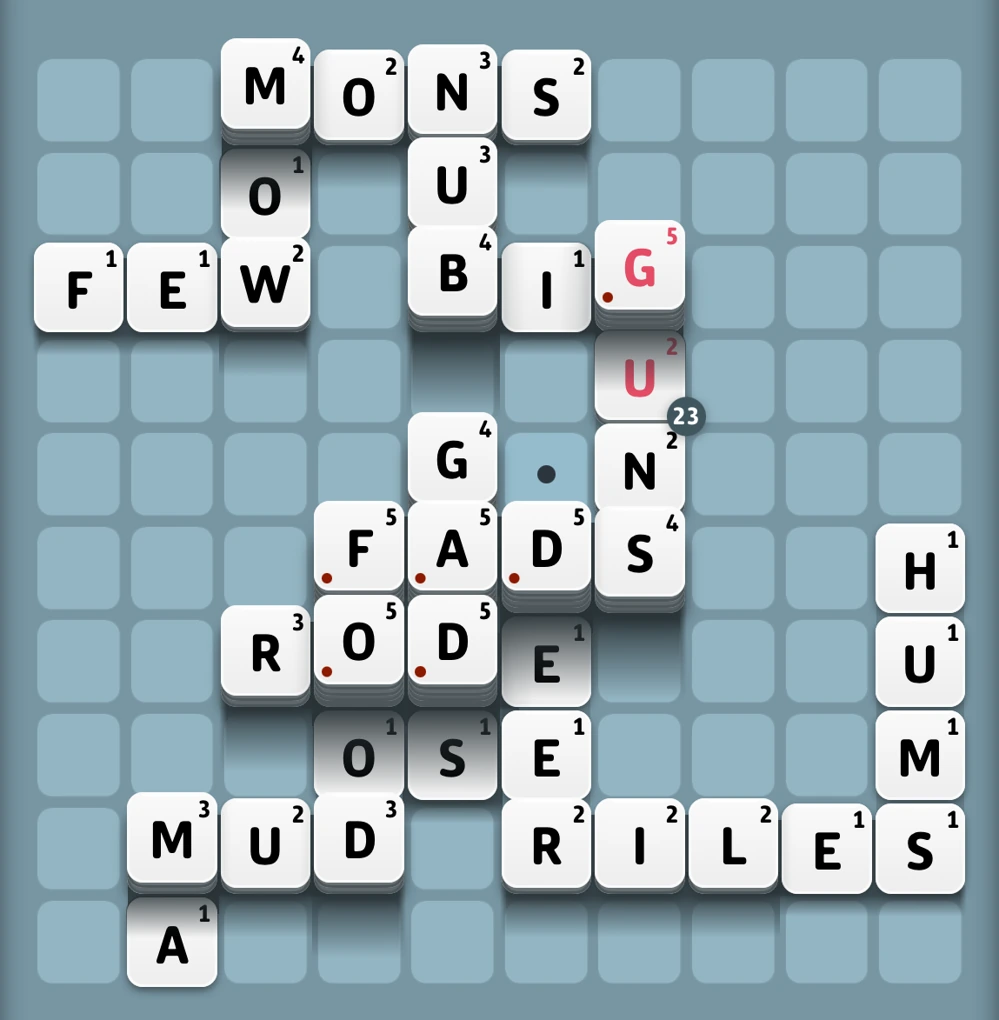 An Upwords game with letters stacked several tiles high, creating new words across the board